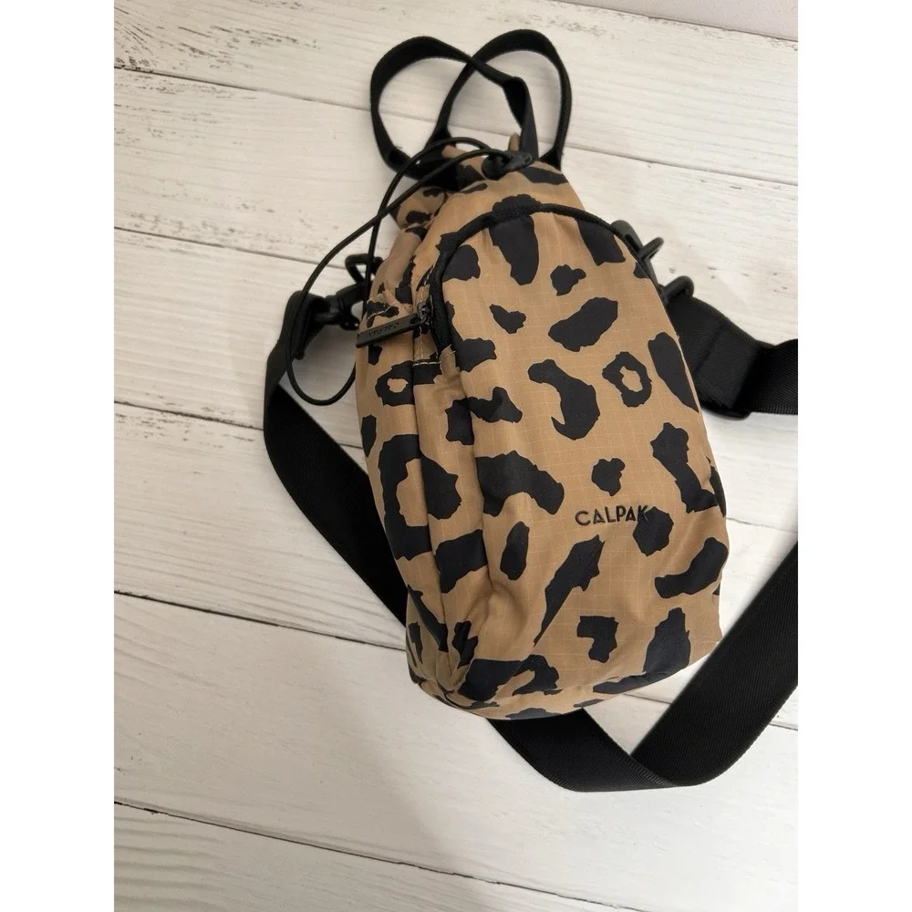 Calpak Insulated Water Bottle Holder Sling Travel Crossbody Bag Cheetah Print